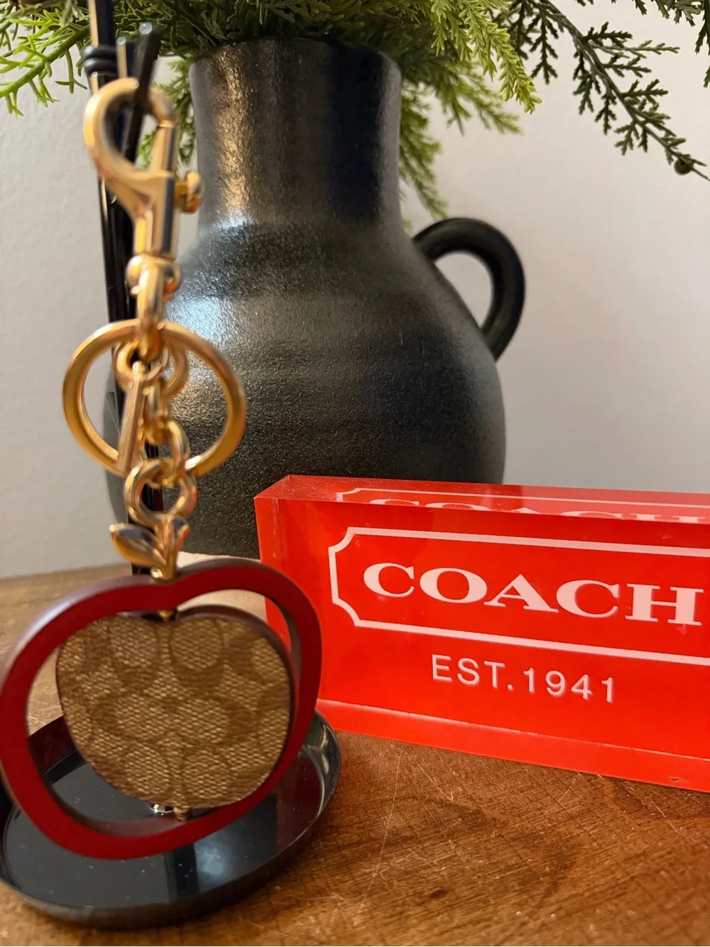 Coach Swivel Apple Charm
